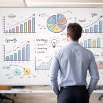 personne-tableau-blanc-graphiques-bureau